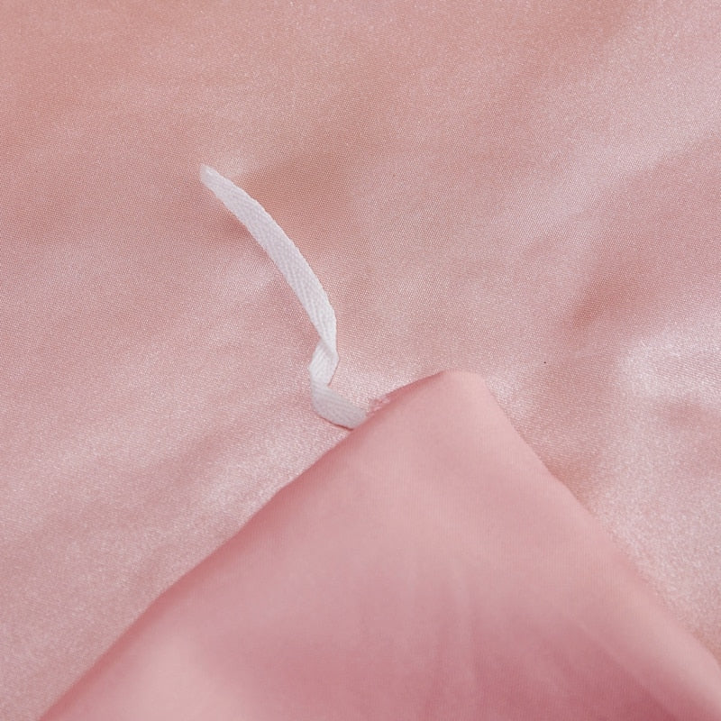 Parure de lit rose poudré en satin