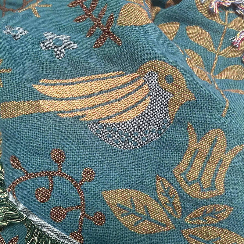 Plaid réversible avec motif d'oiseau scandinave