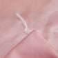 Parure de lit rose poudré en satin