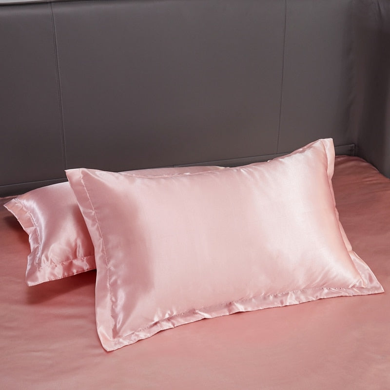 Parure de lit rose poudré en satin